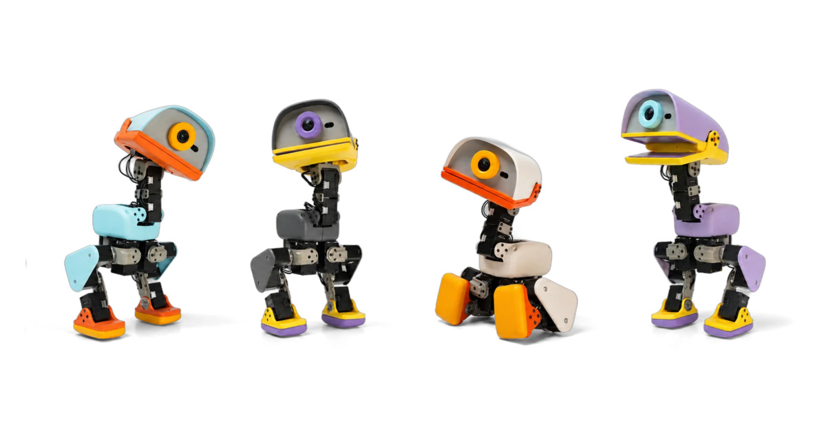 The four Microducks in their four colors, photographed against a white background